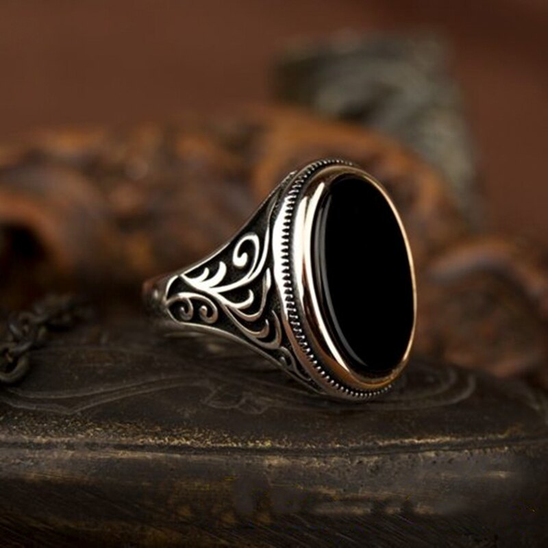 Craved Pattern Black Egg-shaped Crystal Silver Color Ring