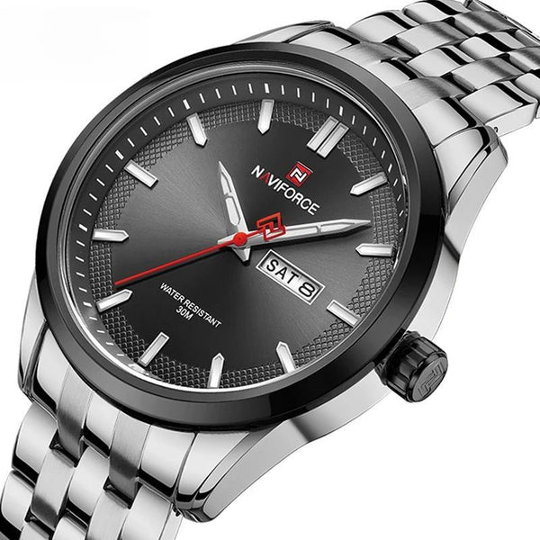 Reloj de pulsera clásico de cuarzo con calendario de acero inoxidable para hombre de negocios.