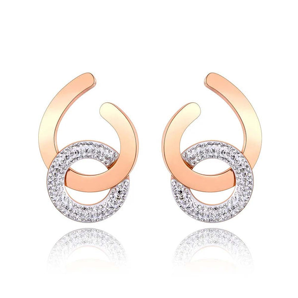 Pendientes geométricos circulares de acero inoxidable y titanio con diseño original para mujer