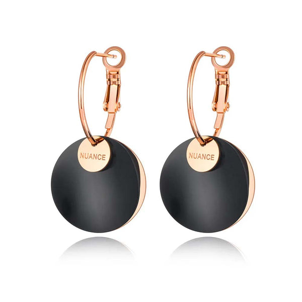 Pendientes de aro geométricos de acero inoxidable y titanio Hyperbole