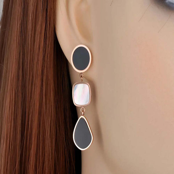 Pendientes colgantes geométricos de acero inoxidable con diseño de concha acrílica estilo bohemio.