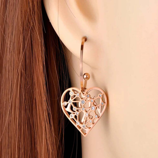 Pendientes de boda de titanio y acero inoxidable con cristales de circonita cúbica.