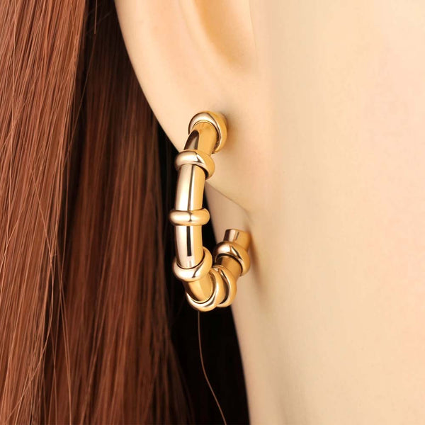 Pendientes llamativos de acero inoxidable en forma de C