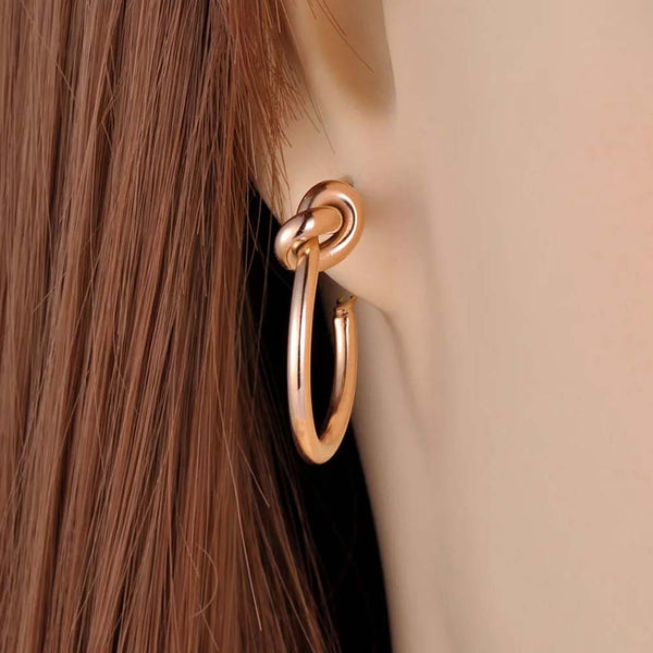 Pendientes de aro anudados de acero inoxidable y titanio de diseño original