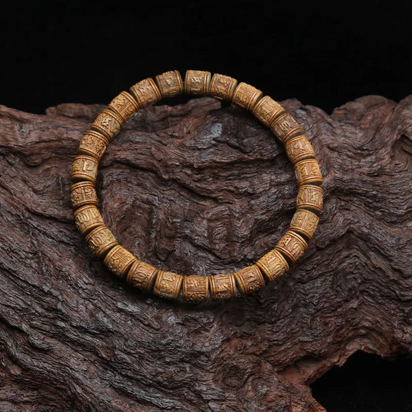 Pulsera tibetana con rueda de oración de sándalo natural con mantra de seis caracteres