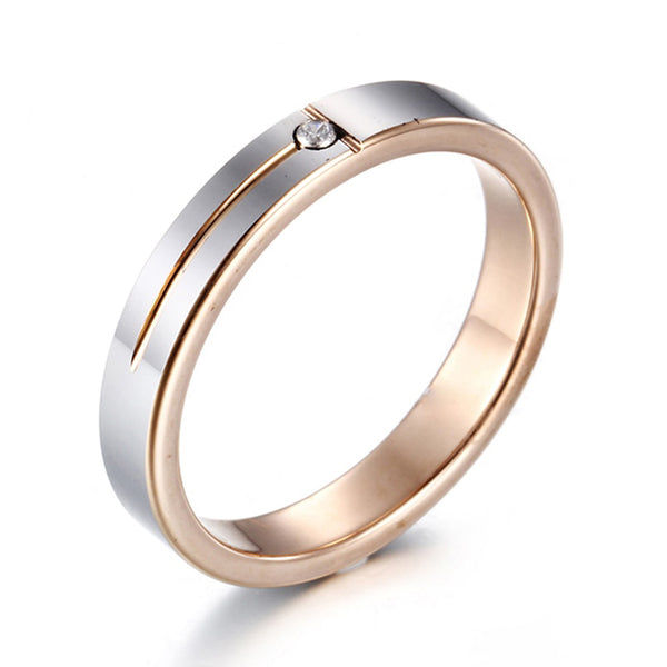 Anillos de acero de tungsteno de 4 mm de color dorado con circonita cúbica transparente para mujeres y hombres.