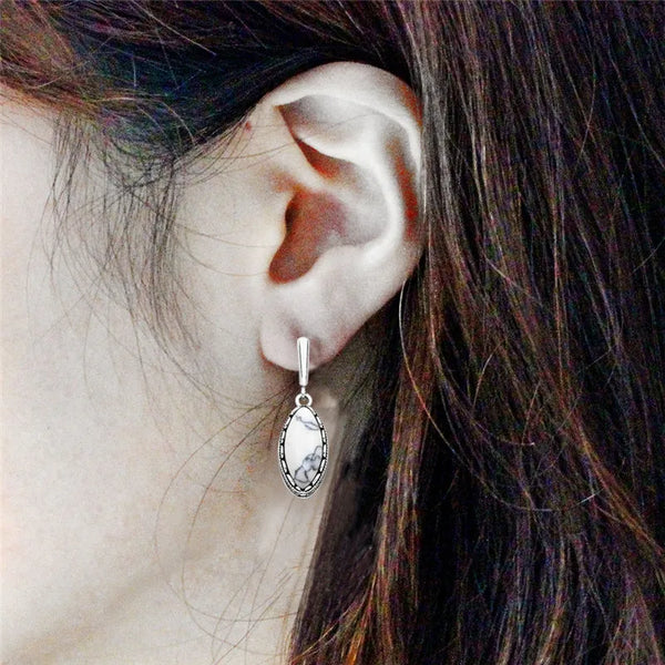 Pendientes de turquesa sintética con forma de ojo en 5 colores para mujer