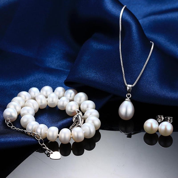 Conjunto de tres joyas con pulsera, colgante y pendientes de perlas auténticas para mujer