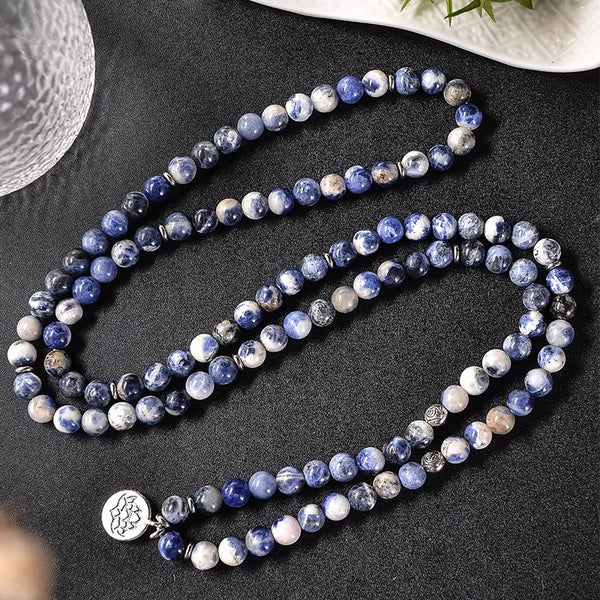 Pulsera Mala 108 con cuentas de vena azul y flores naturales de 8 mm para meditación, yoga y sanación.