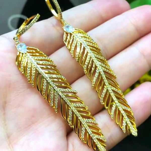 Nuevo diseño de pendientes largos de plumas de lujo para mujer, ideales para bodas, fiestas y espectáculos.