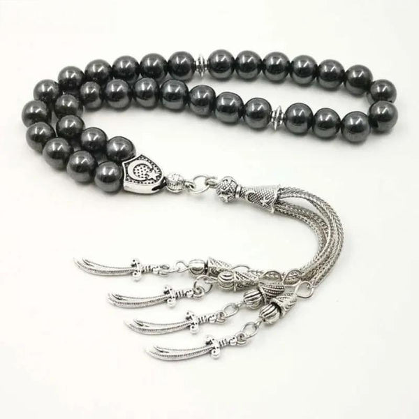 Cuentas de oración Tasbih de hematita natural con borla de metal para hombre, precio económico y de buena calidad.