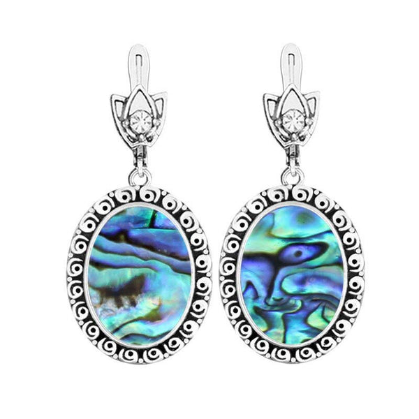 Pendientes de concha ovalada para mujer, con flor de caracol, chapados en plata antigua.