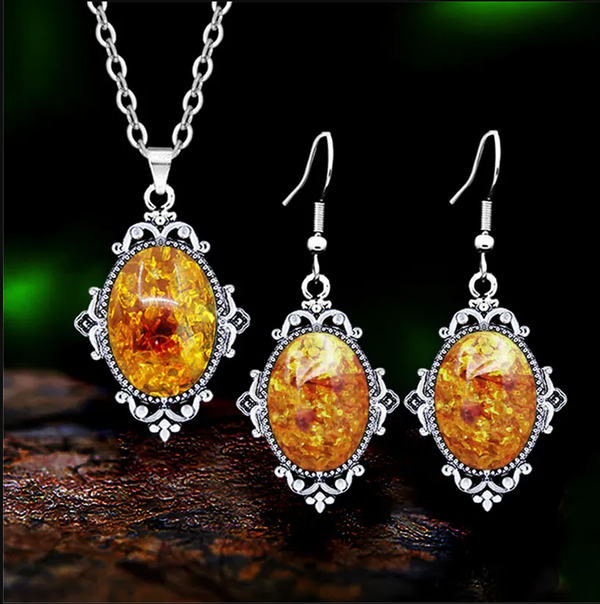 Conjunto de collar y pendientes con ámbar sintético y colgante de hoja vintage