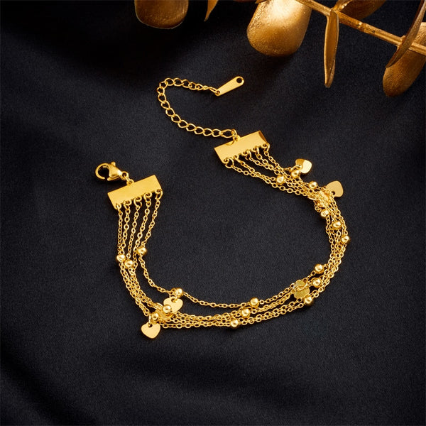 Pulsera multicapa de acero inoxidable 316L con forma de corazón en color dorado para mujer