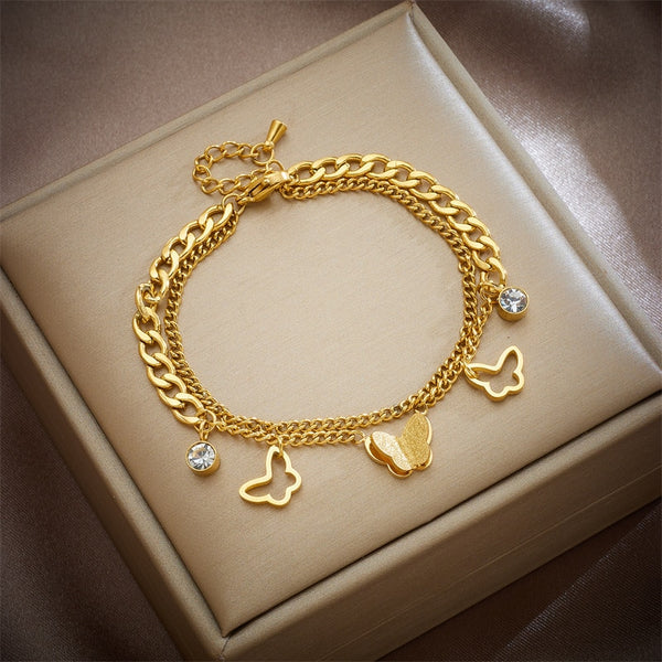 Pulsera multicapa de acero inoxidable 316L con dije de mariposa de circonita para mujer