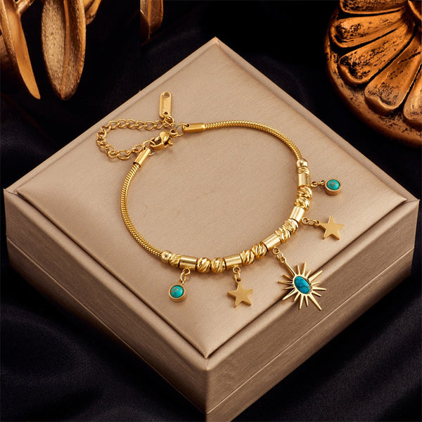 Pulsera con dije de sol y estrella de acero inoxidable 316L, color dorado y piedra verde, para mujer