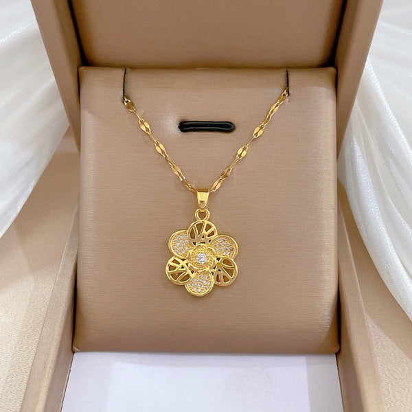 Collar con colgante de flor de acero inoxidable 316L color dorado para mujer