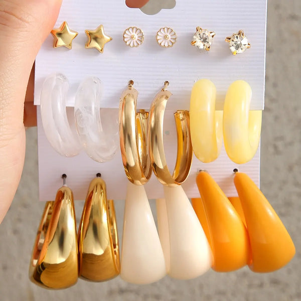 9 pares de pendientes de colores para dama