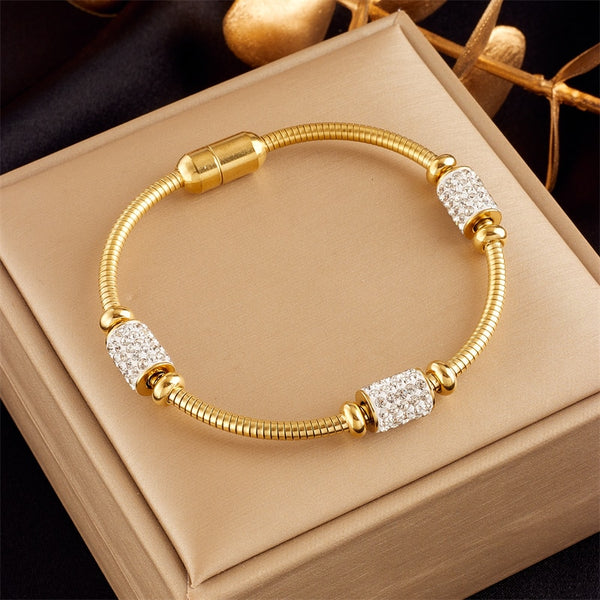 Pulsera de acero inoxidable 316L con circonitas doradas para mujer
