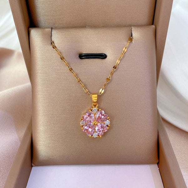 Collar para niña con colgante de flor de circonita morada en color dorado