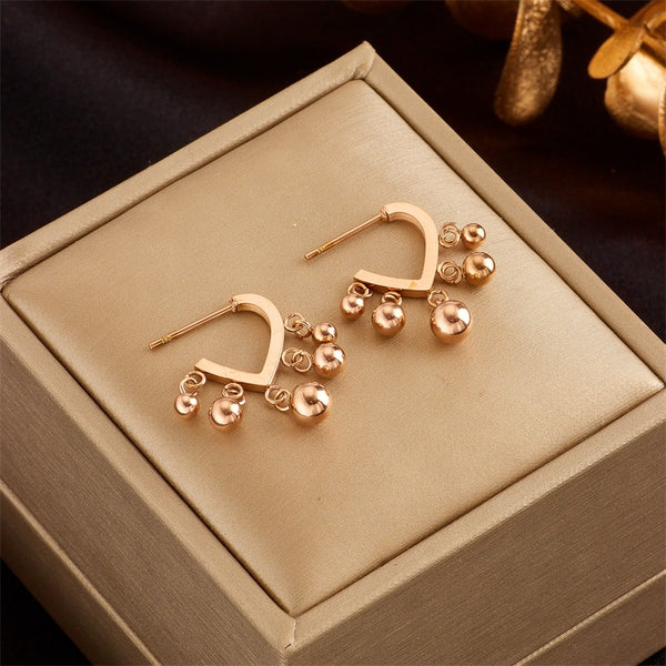 Pendientes de acero inoxidable 316L con borlas y bolas para mujer
