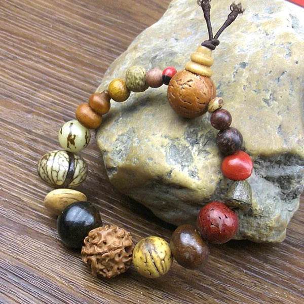 Pulsera vintage de 18 semillas de Bodhi naturales con dijes de Buda