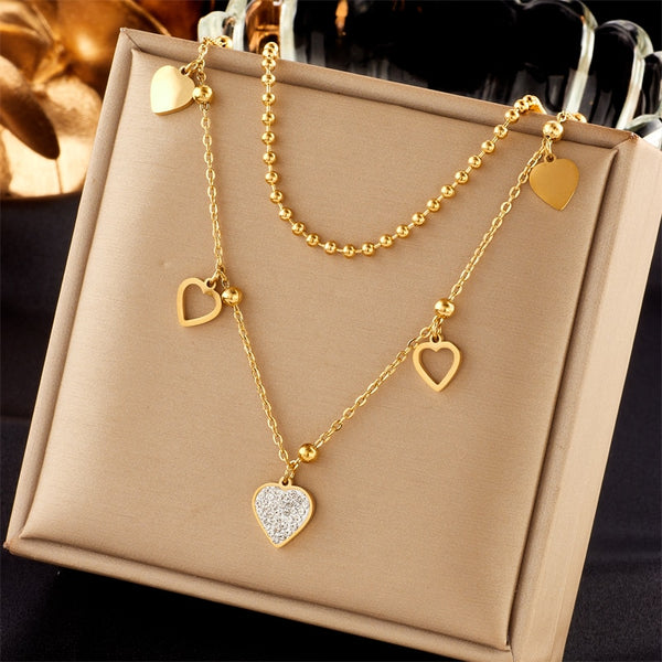 Collar con colgante de corazón de acero inoxidable 316L y diamantes de imitación para mujer