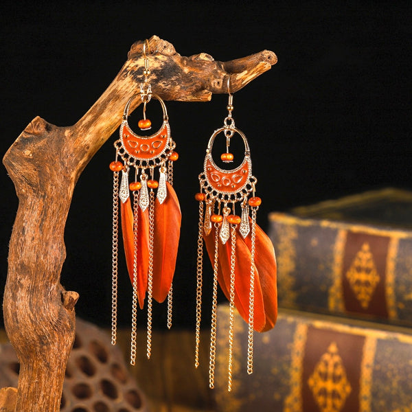 Pendientes largos de plumas marrones de moda para mujer