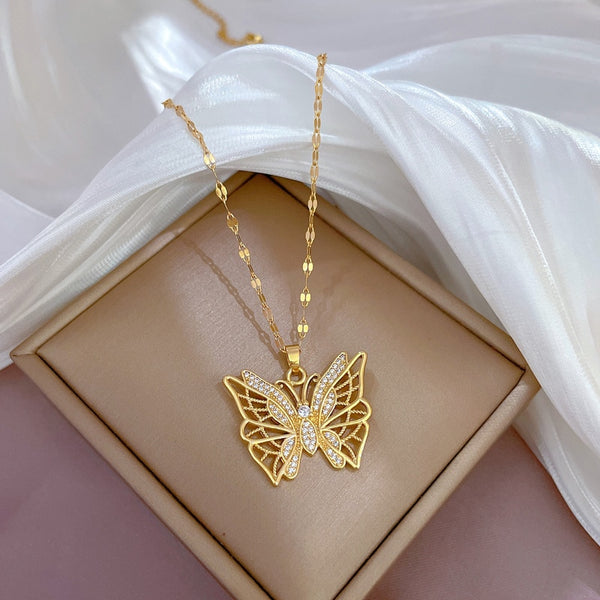 Collar con colgante de mariposa hueca de acero inoxidable 316L para mujer