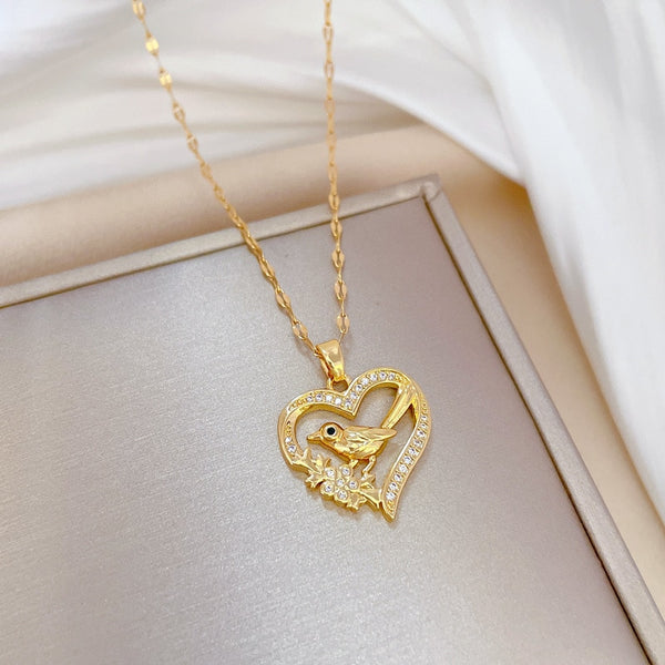 Collar con colgante creativo de pájaro y corazón de acero inoxidable 316L para mujer