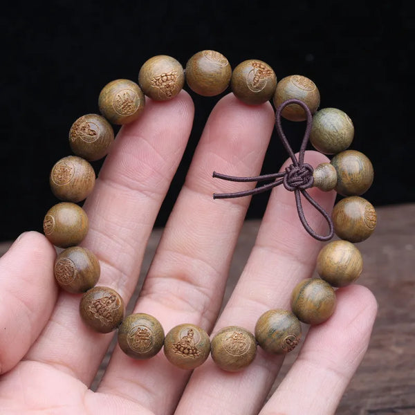 Pulsera de mujer con cuentas de sándalo verde natural de 12 mm.