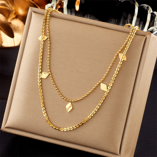 Collar rómbico multicapa de acero inoxidable 316L color dorado para mujer