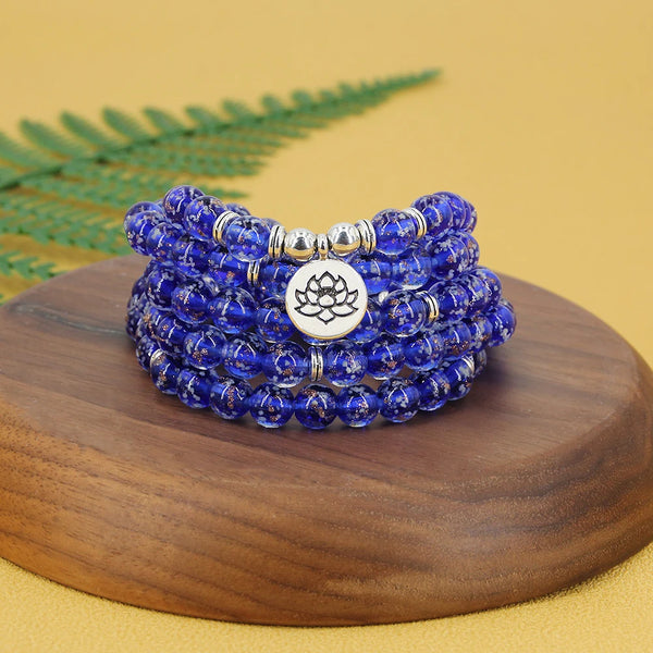 Pulsera de 108 cuentas mala con piedras azules, de loto y de Buda, luminosas.