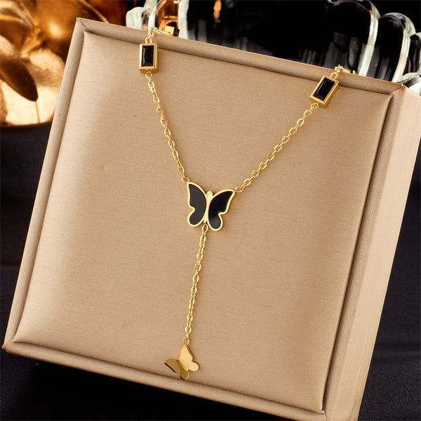Collar largo con colgante de mariposa de circonita negra de acero inoxidable 316L para mujer