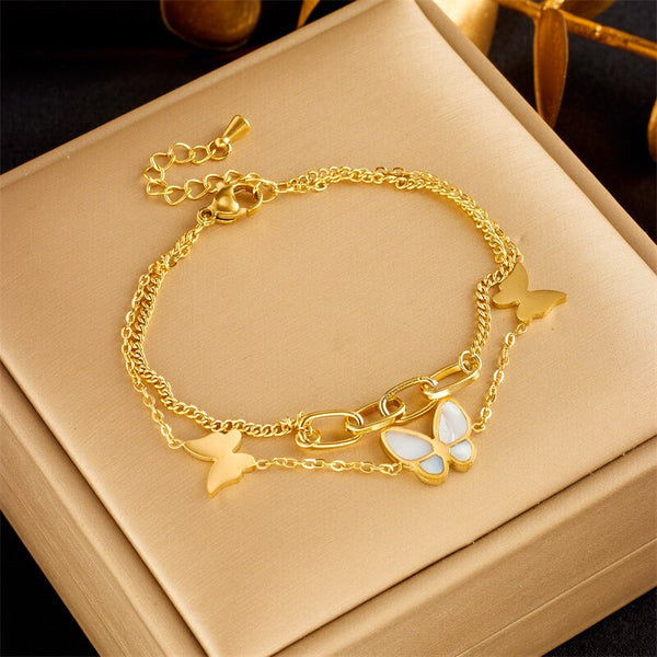 Pulsera de acero inoxidable 316L con doble capa de mariposa para mujer