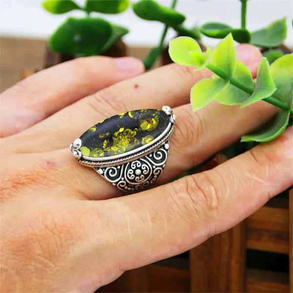Anillos vintage de ámbar verde sintético con forma de ojo para mujer