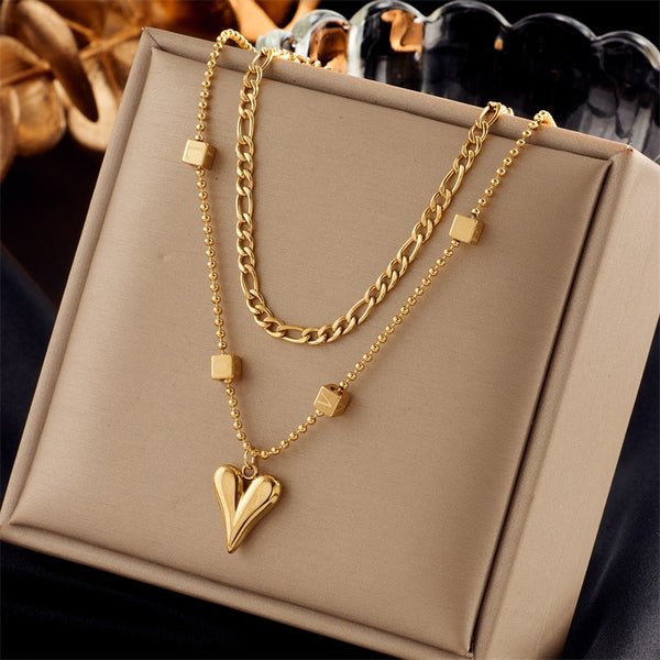 Collar con colgante de corazón multicapa de acero inoxidable 316L color dorado para mujer