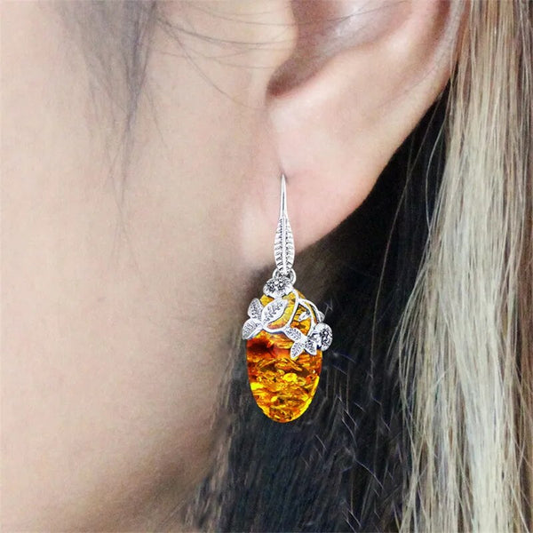 Pendientes vintage con forma de ojo y flor de ámbar simulada para mujer