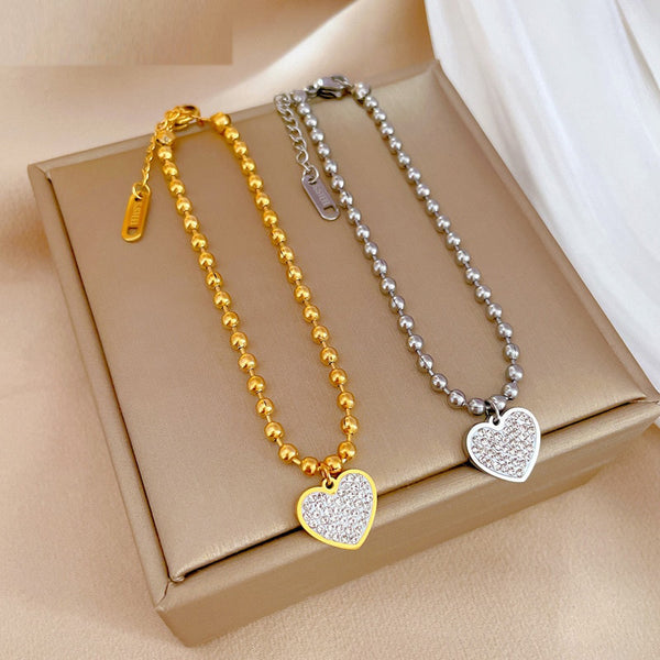 Pulsera con dije de corazón de amor y diamantes de imitación en acero inoxidable 316L, color dorado y plateado, para mujer