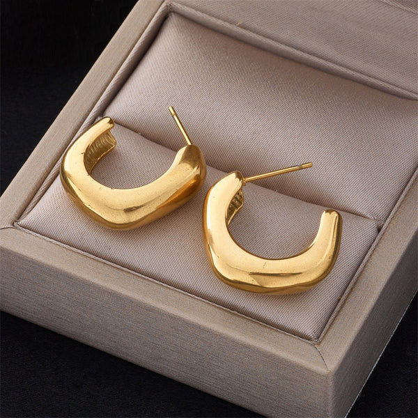 Pendientes de acero inoxidable 316L color dorado para mujer, de alta calidad, con forma de C geométrica.