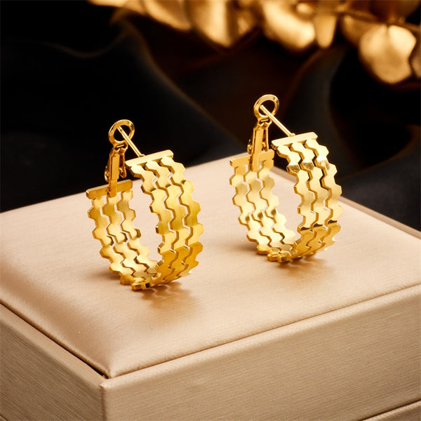 Pendientes de aro con ondas geométricas de acero inoxidable 316L en color dorado para mujer