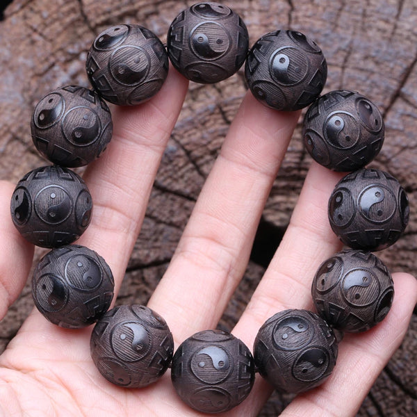 Pulsera de madera de ébano para hombre, símbolo de la filosofía.