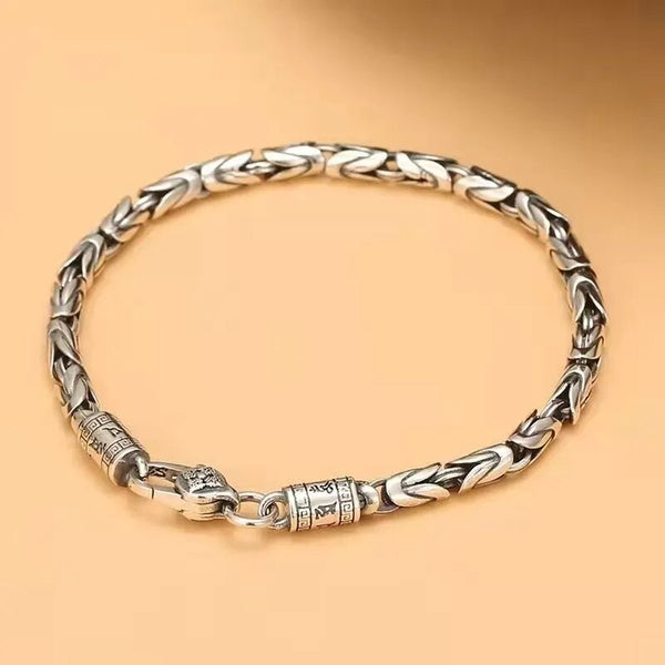 Pulseras trenzadas seguras de color plateado para hombre, un nicho de moda para regalo de novio, pulsera para mujer