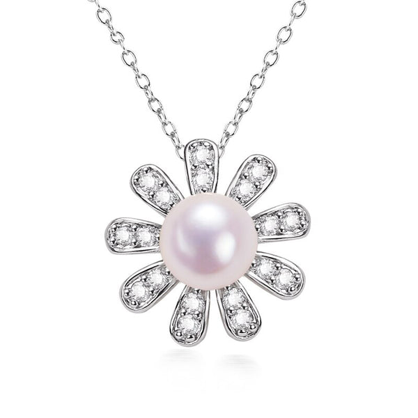 Colgante de perla margarita en plata 925 y baño de oro de 18 quilates. Collar de perlas 100 % naturales.
