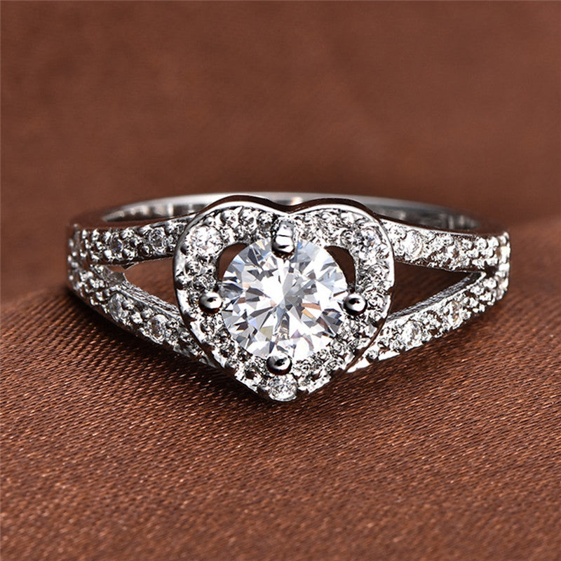 Gothic Skull Hand Holding Peach Heart Zircon Ring