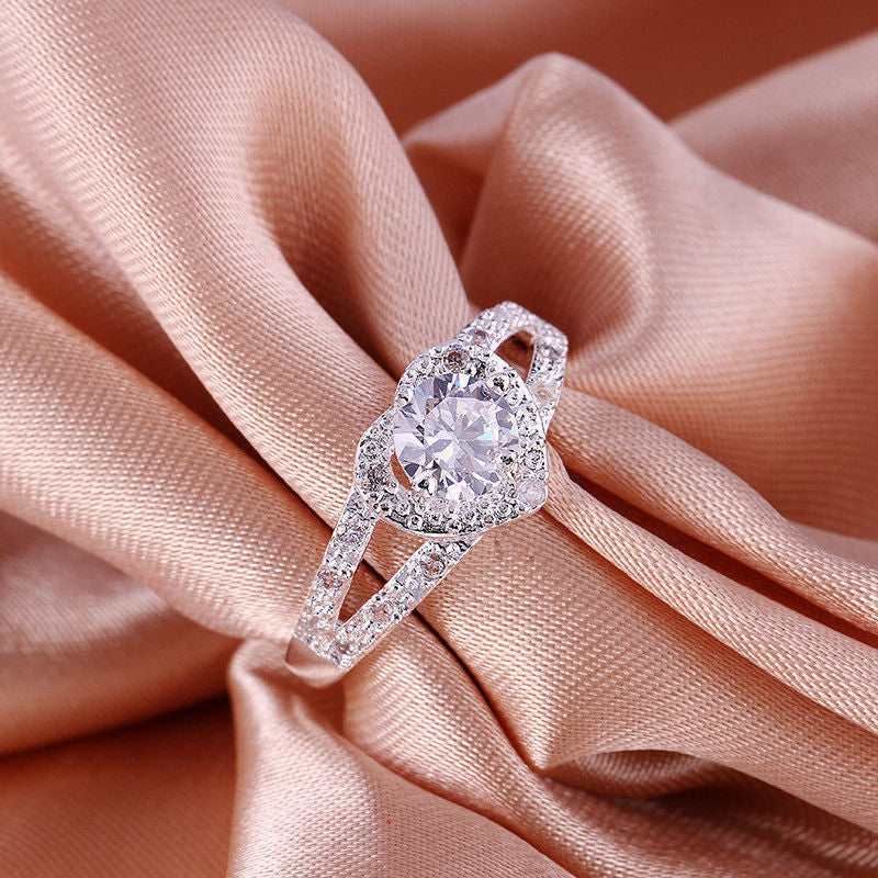 Gothic Skull Hand Holding Peach Heart Zircon Ring