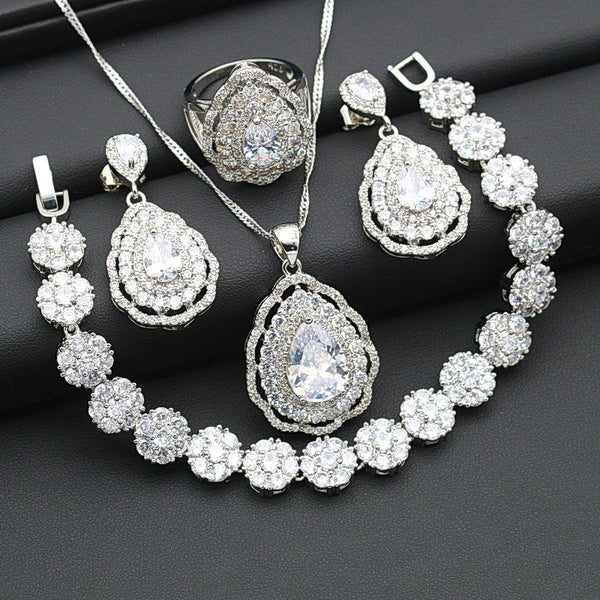 Exquisitos conjuntos de joyas de color plata con circonita cúbica blanca
