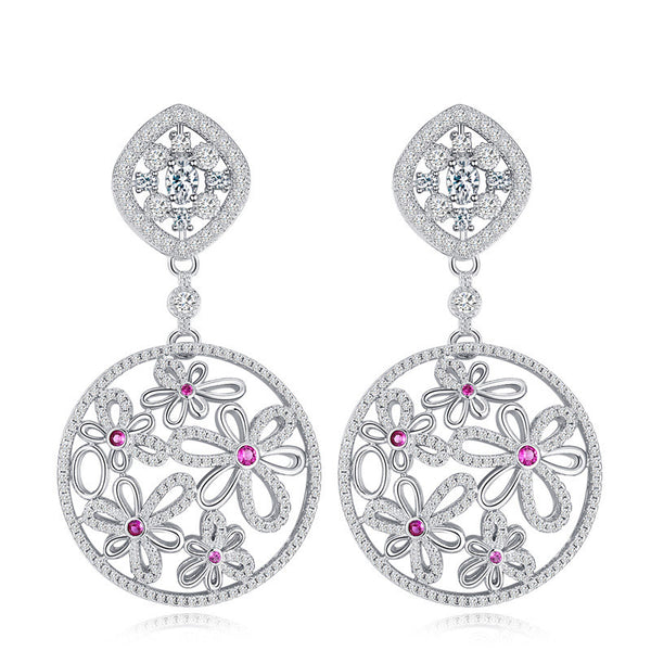 Pendientes largos con forma de flor de mariposa hueca y circonita cúbica para mujer