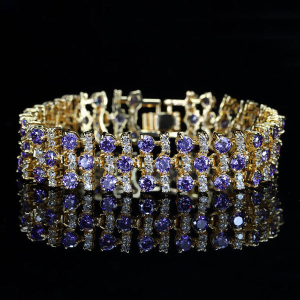 Pulsera clásica de color dorado con cristales austriacos y piedras moradas