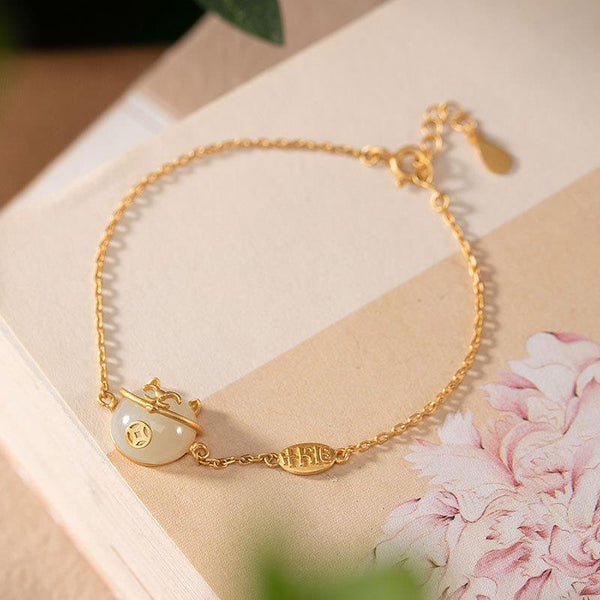Pulsera de gato de jade hetiano natural con incrustaciones doradas y diseño inspirado